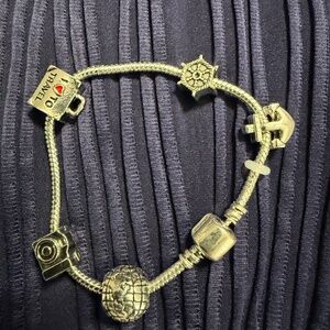 Ship bracelet, like pandora 7.5 inches 5 charms